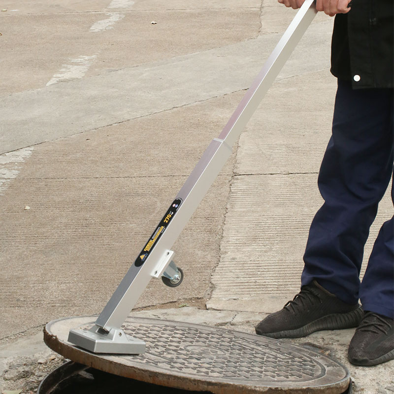 Manhole cover lifter