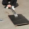 Manhole cover lifter